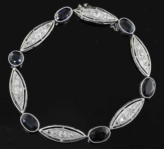 An early-mid French 18ct gold and platinum, sapphire and diamond set bracelet,